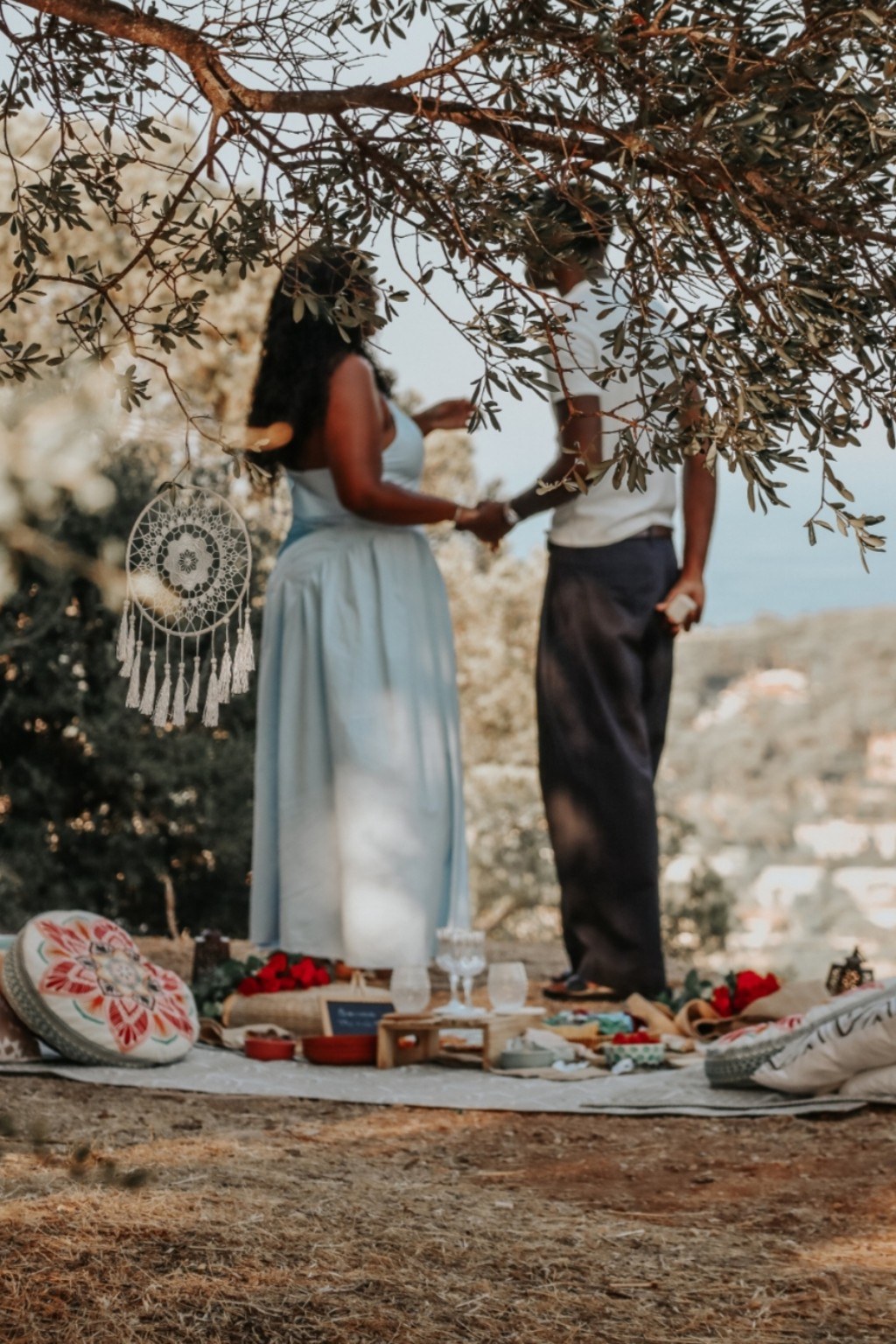 Romantic picnic for two under an olive tree — a proposal moment on the French Riviera
